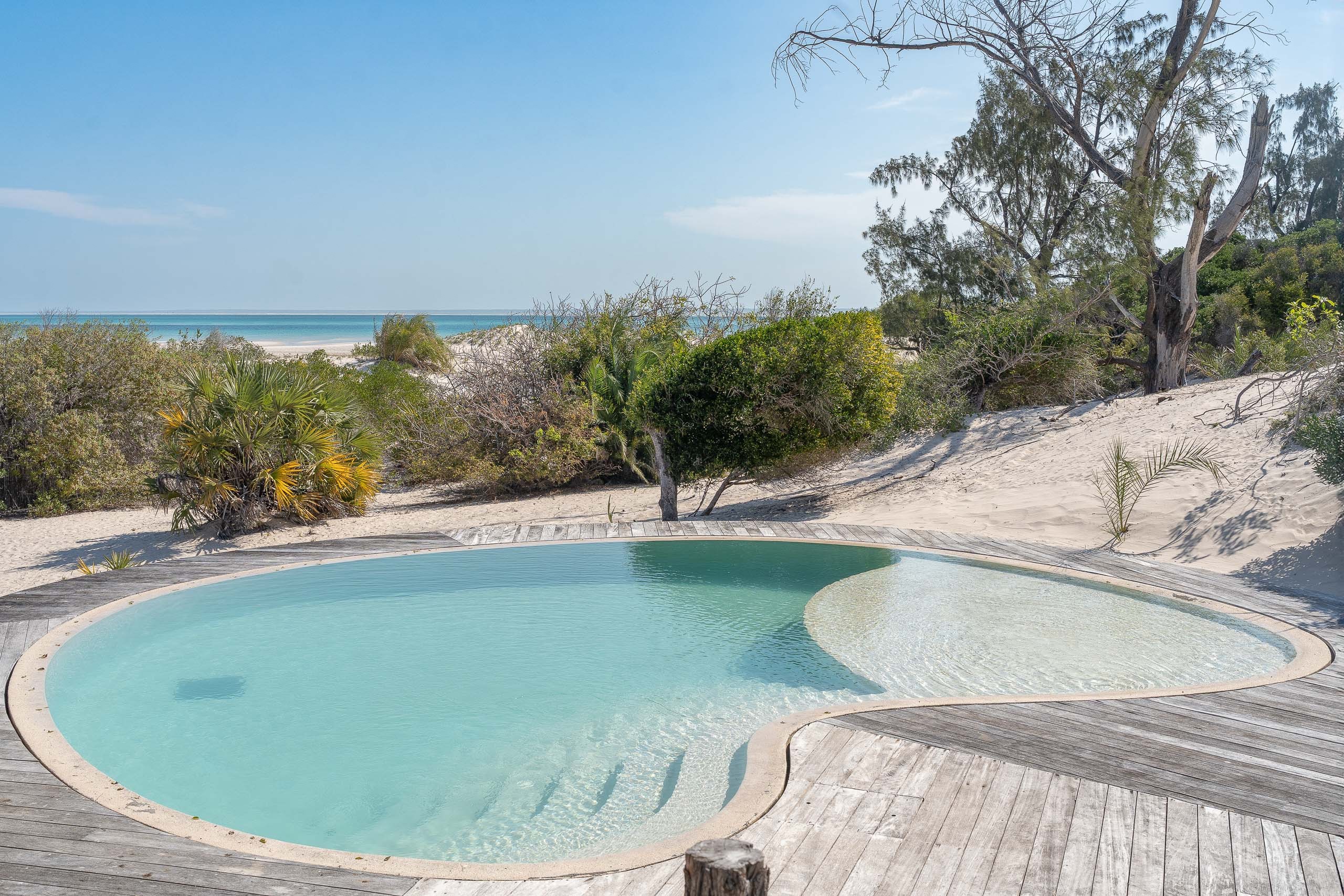 A private infinity pool set into the dunes overlooking the Indian Ocean at Kisawa Sanctuary, Benguerra Island
