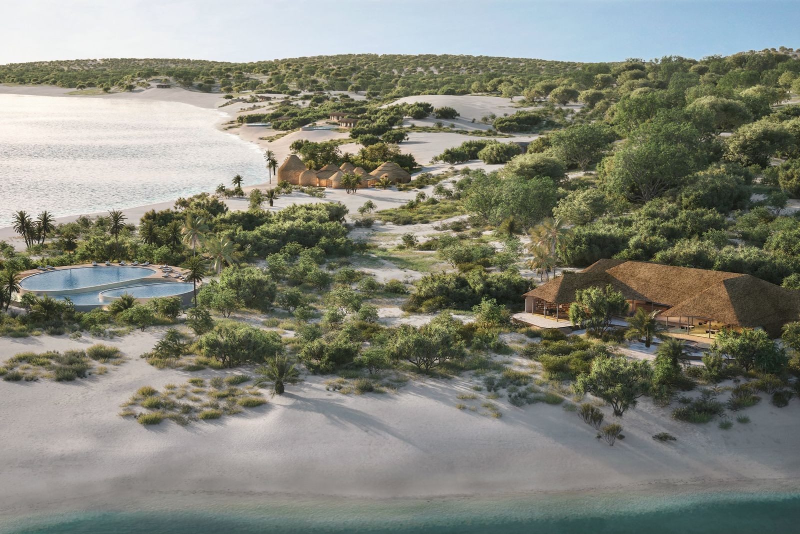 Aerial view of Kisawa Sanctuary's thatched villas and sand-built architecture on Benguerra Island