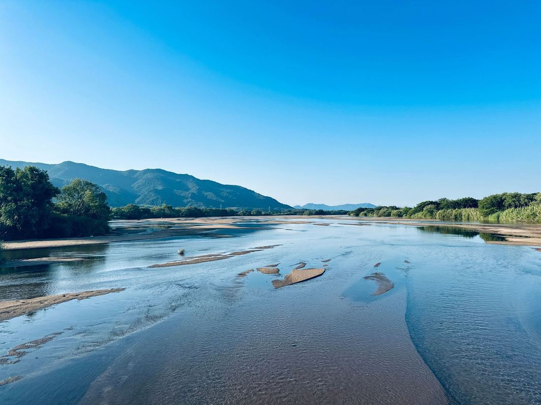 A wide, calm stretch of the Zambezi River near Mana Pools, Zimbabwe